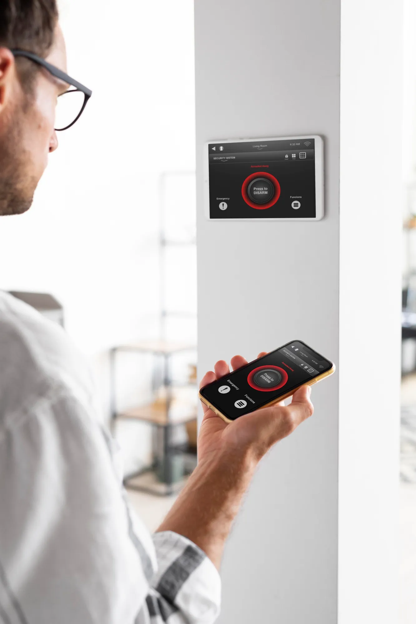 AJ Secure engineer installing a fire alarm panel on a UK commercial site