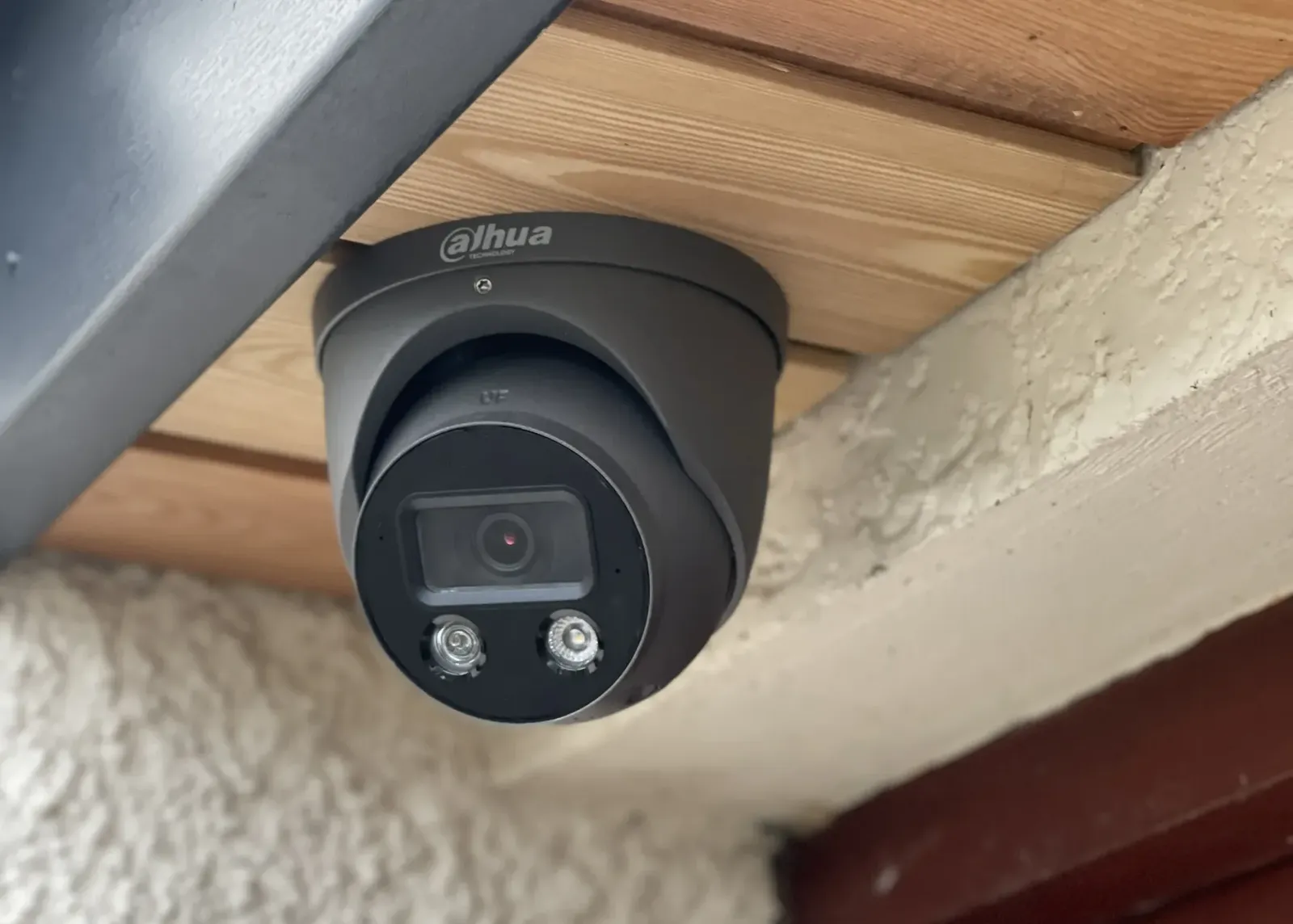 HD CCTV dome camera installed on a commercial building exterior
